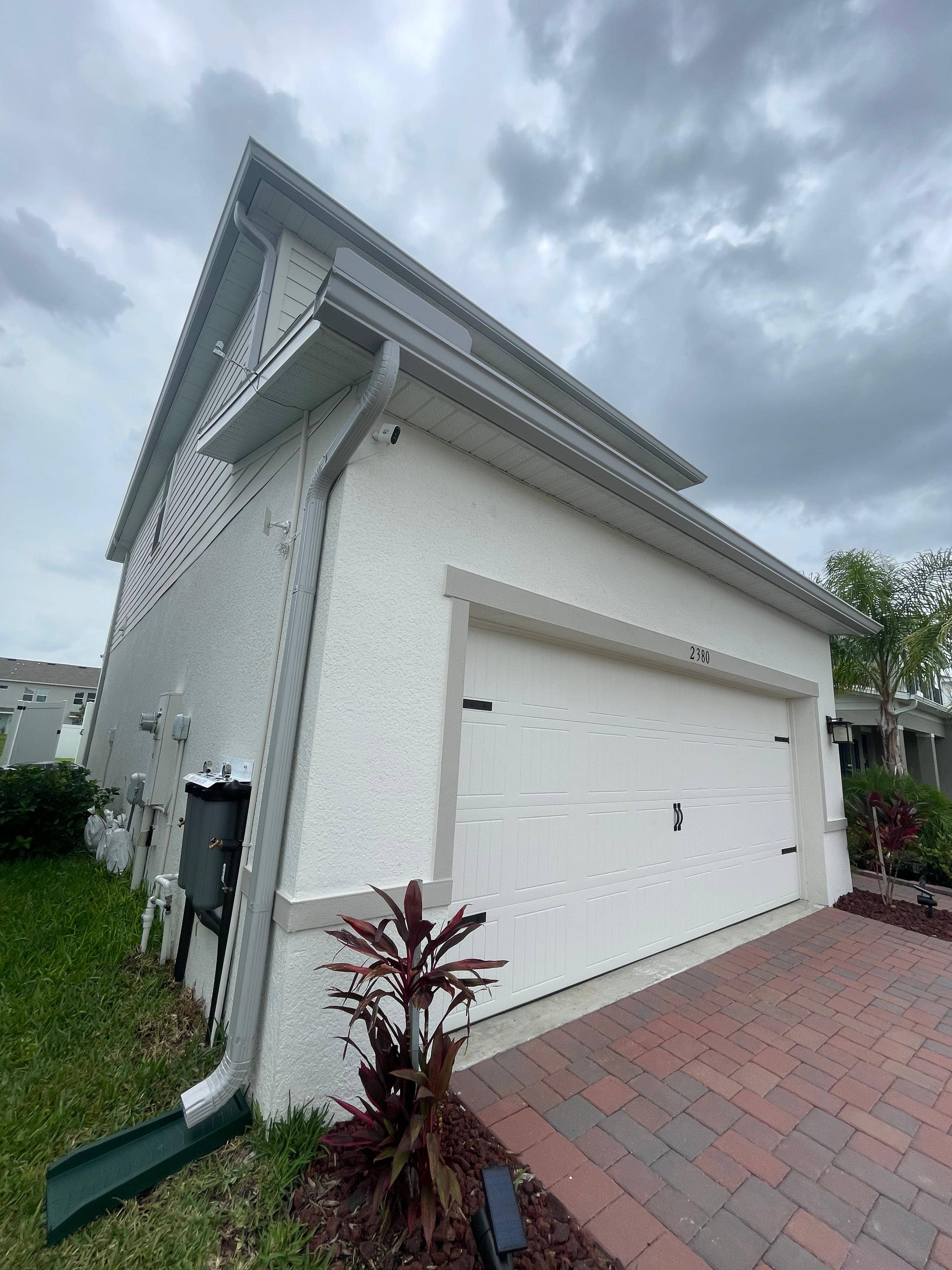 Home exterior after seamless gutter installation