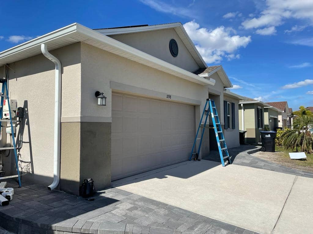 Seamless gutters installed on Florida home roofline