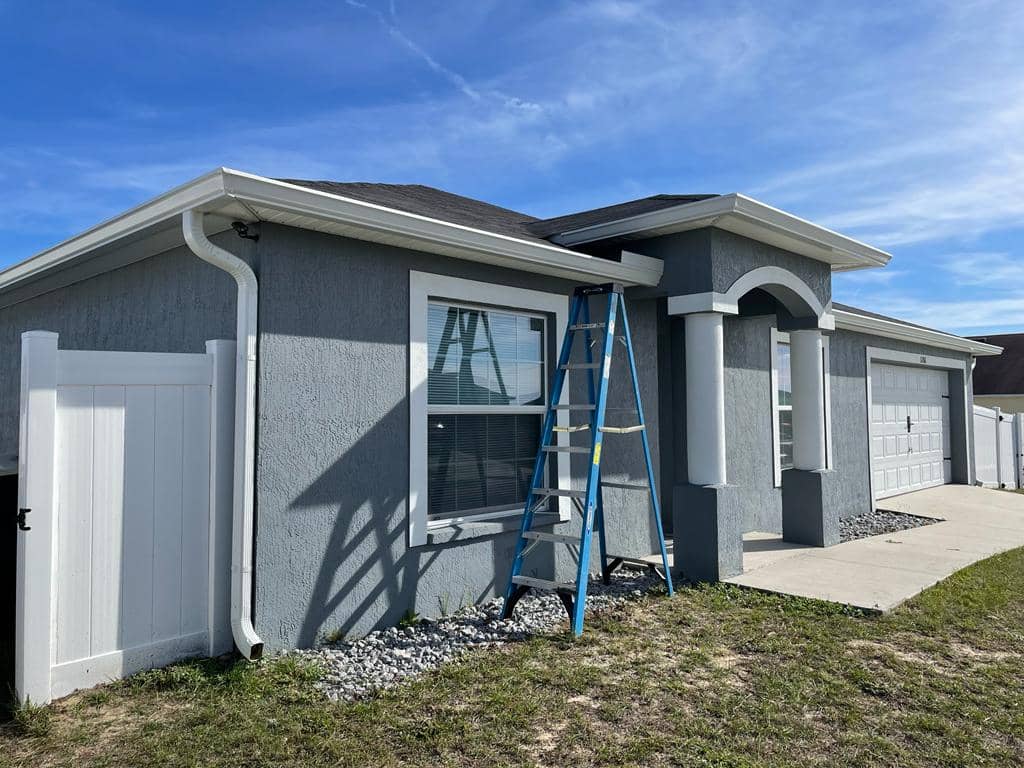 house with white seamless gutters